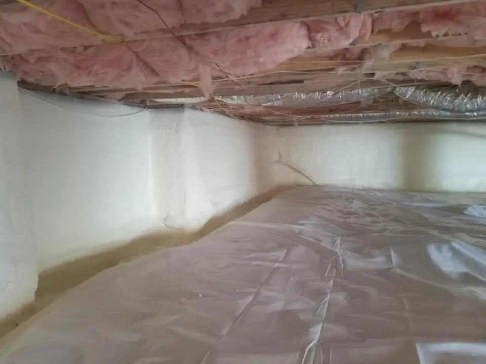 Crawl space encapsulation with closed-cell spray foam for Commercial Roof Restoration in Deptford